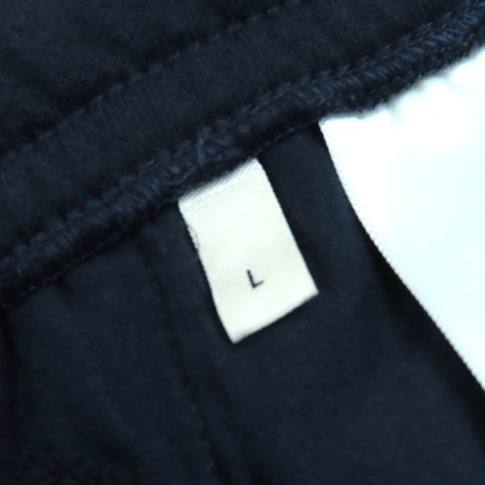 セリーヌ Eddie Triomphe刺繍コットンパンツ