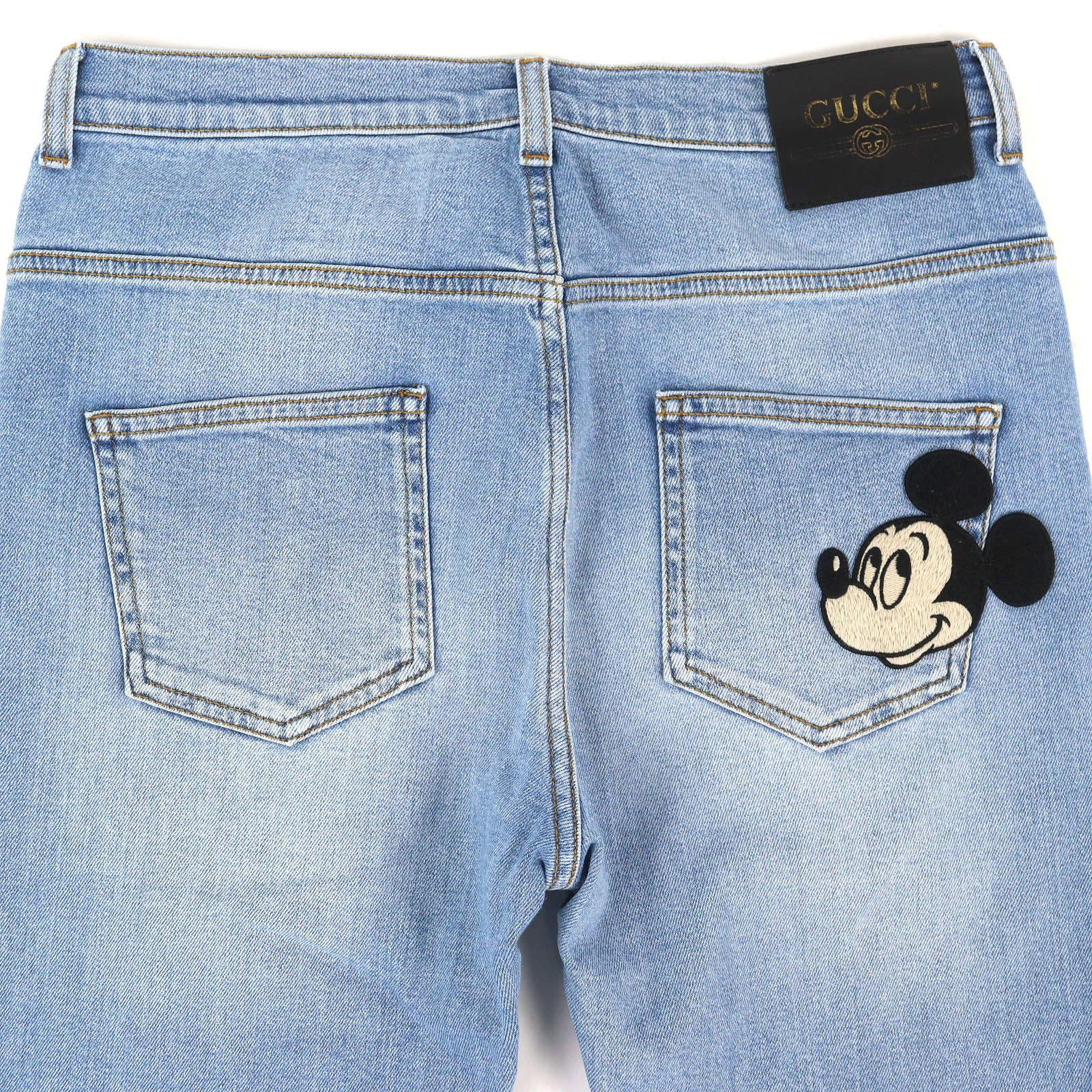 グッチディズニー ロゴパッチ デニムパンツ
