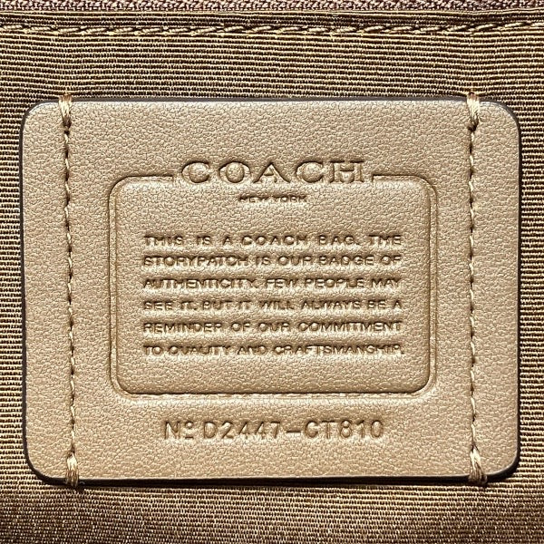 コーチ シグネチャーキャンバス バックパック