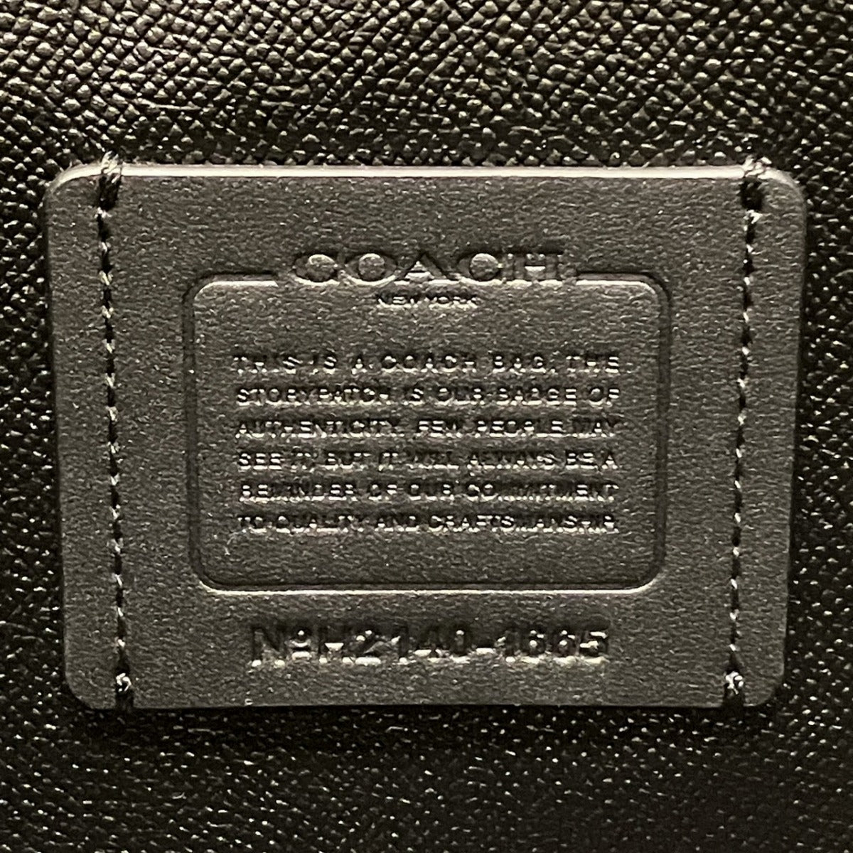 コーチ シグネチャー PVCレザー トートバッグ