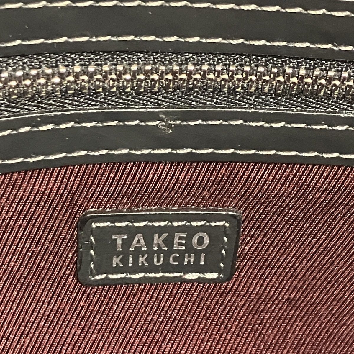 タケオキクチ レザークラッチバッグ