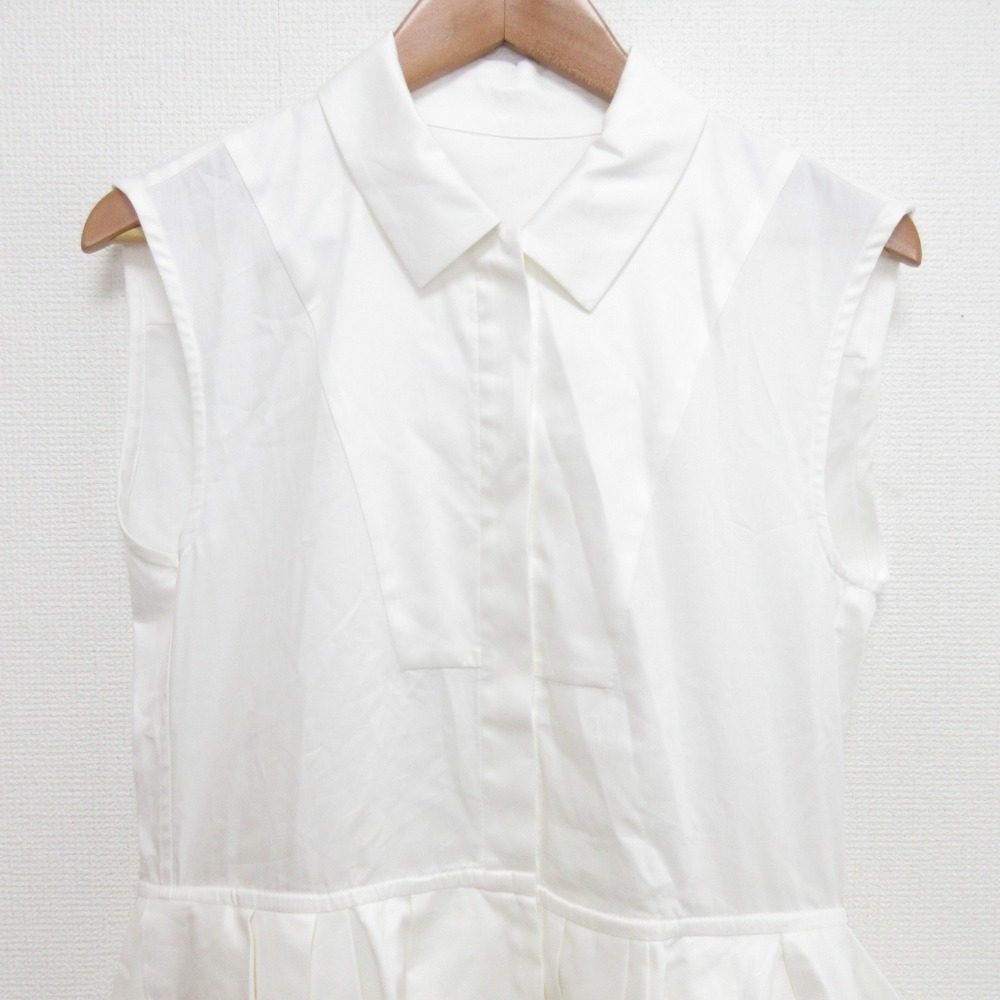 cygne ペプラムノースリーブシャツ