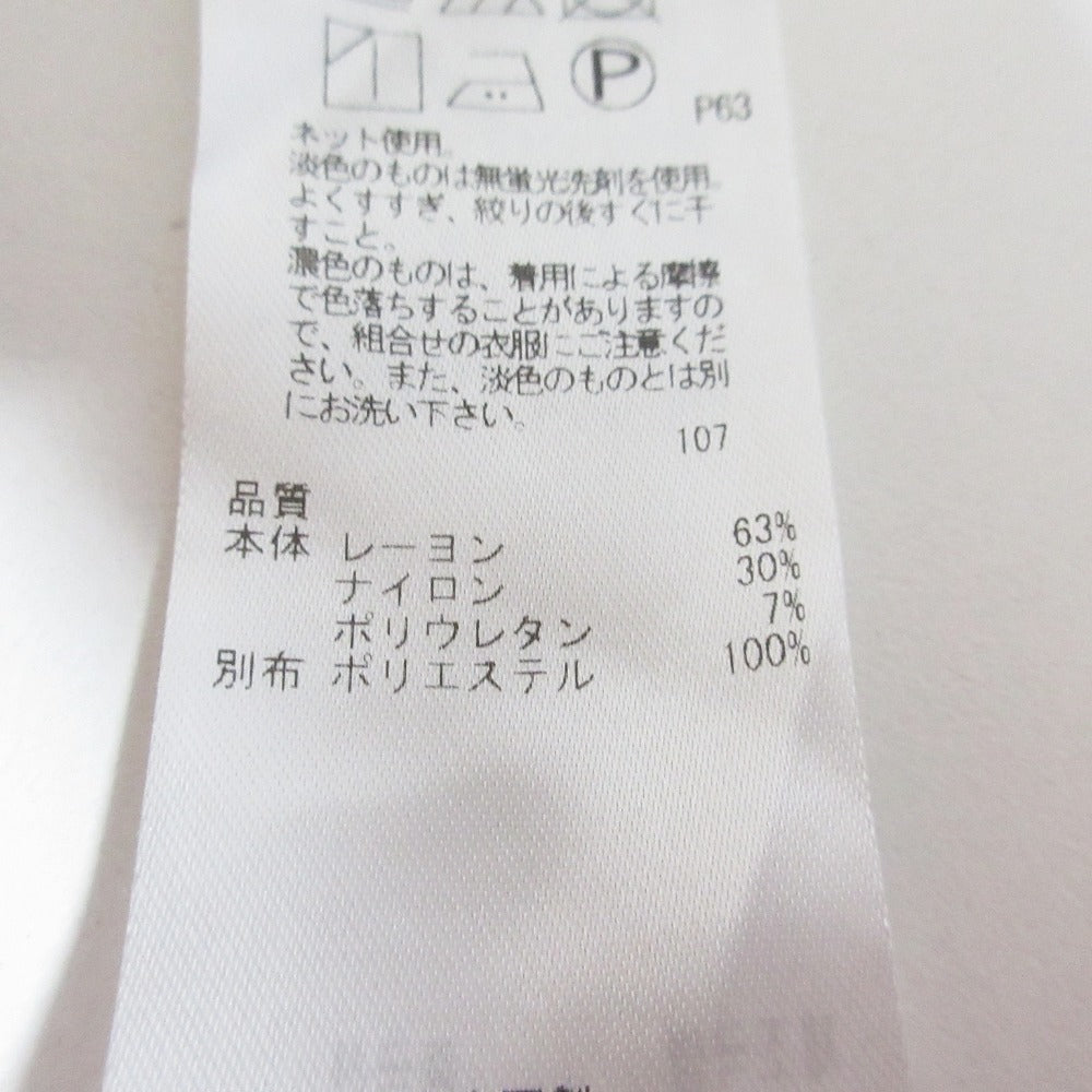 自由区 ドレーピーポンチラッフルスリーブカットソー