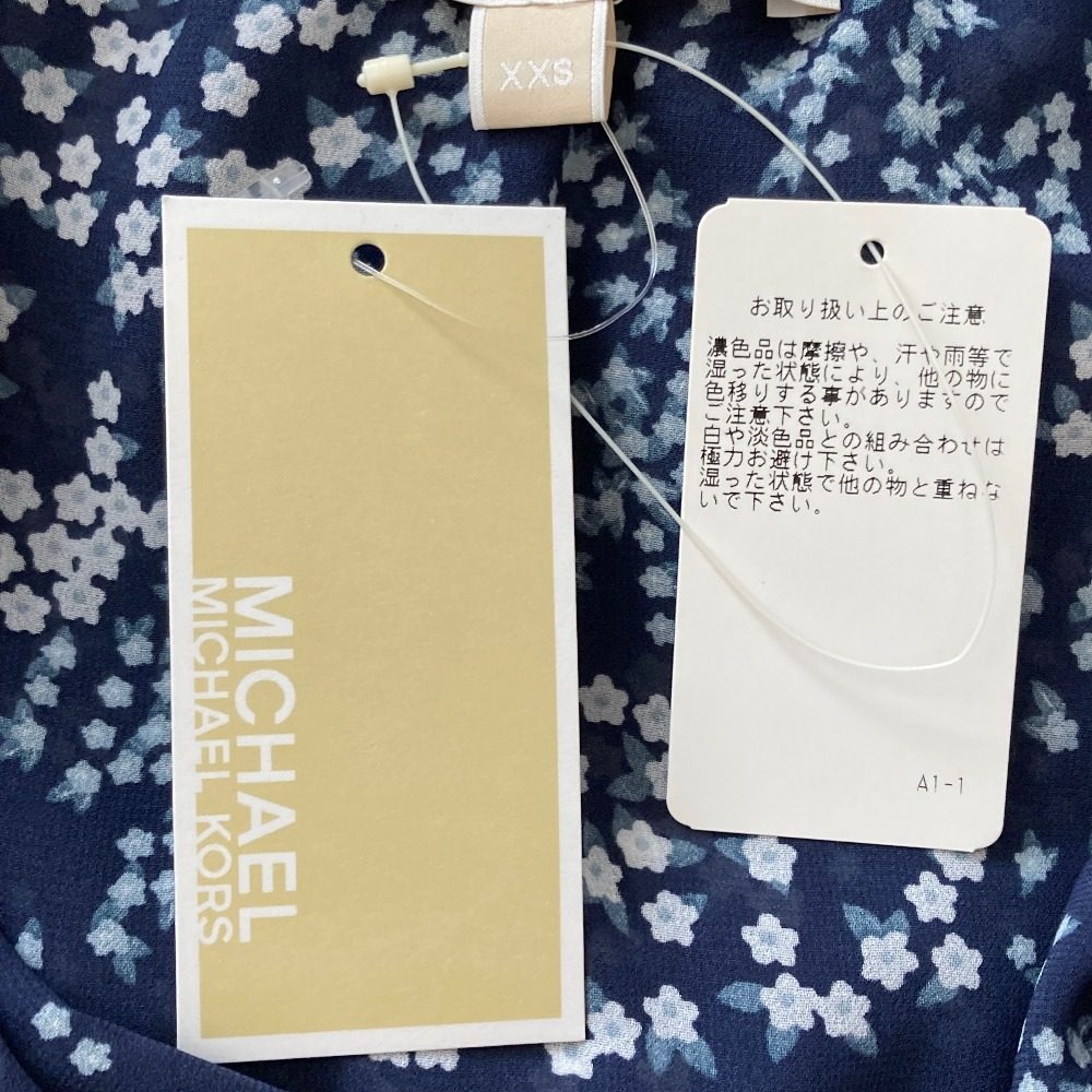 マイケルコースラッフルセットアップ