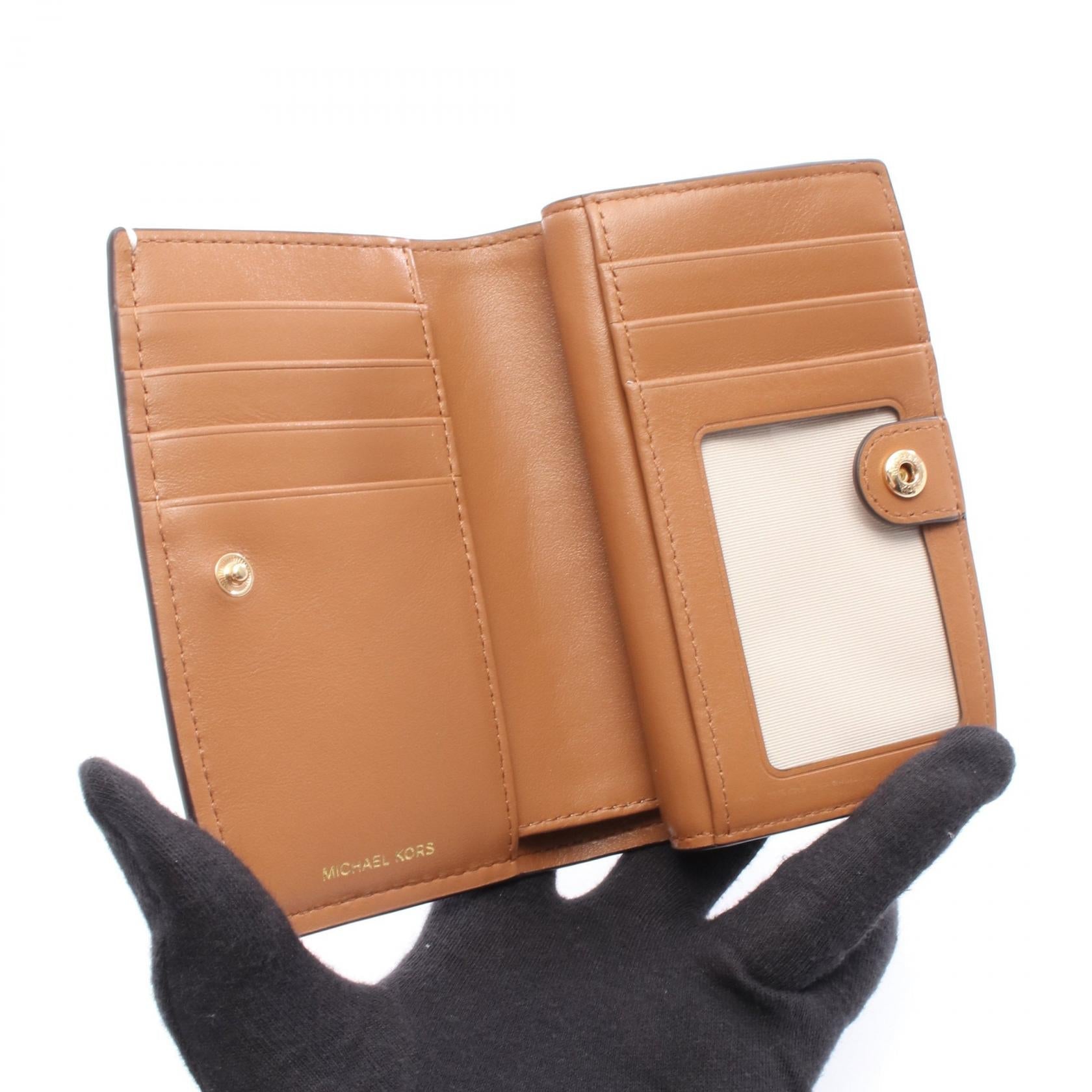 マイケルコース BRYANT PVCコーティングキャンバス財布