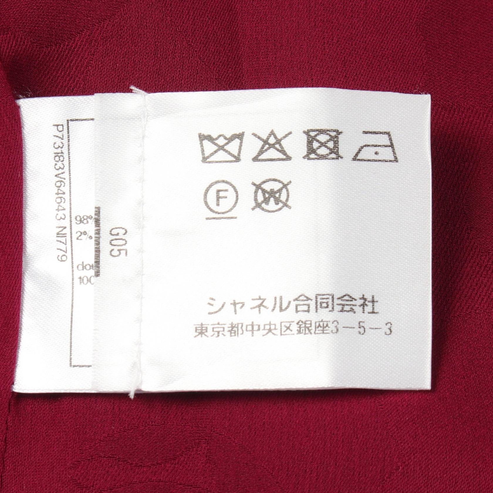 シャネル ココマークボタン ツイードノーカラージャケット