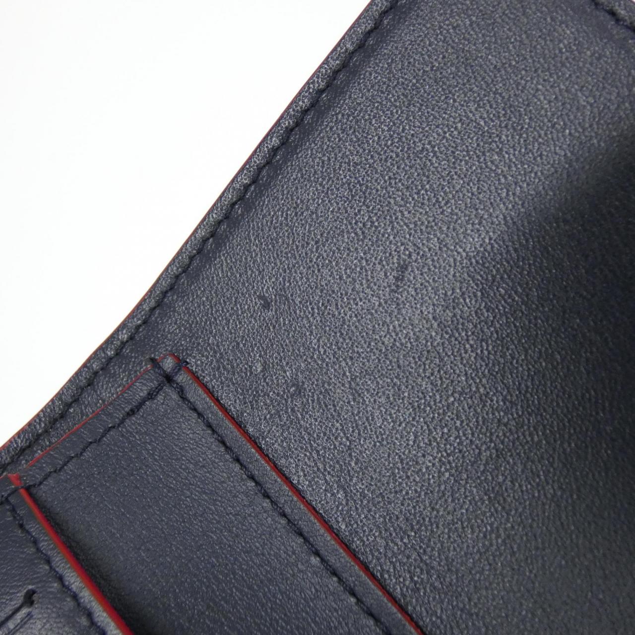 ルイヴィトン ポルトフォイユカプシーヌコンパクト トリヨン 財布