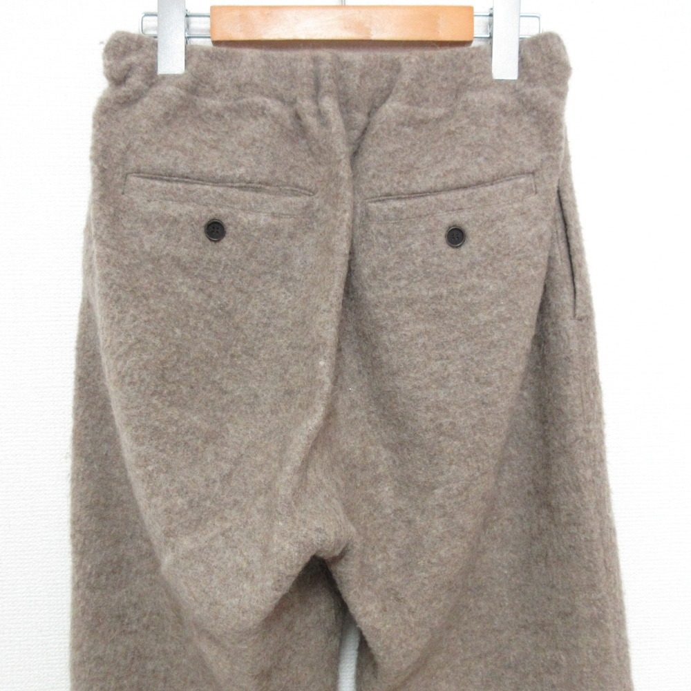 ネストローブ ウールパンツ