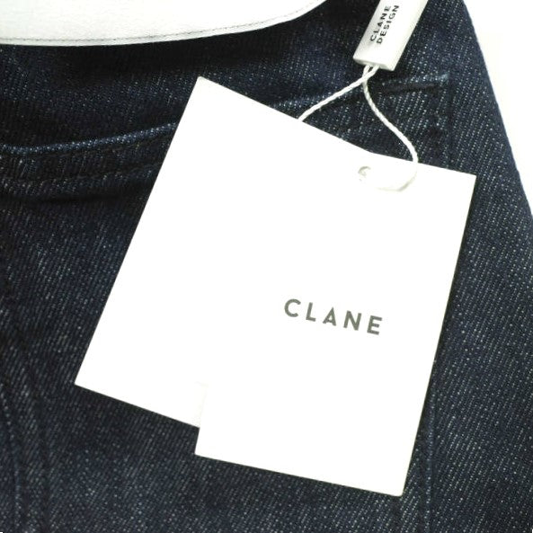 CLANE カラー ダイ ブーツ カット デニム パンツ