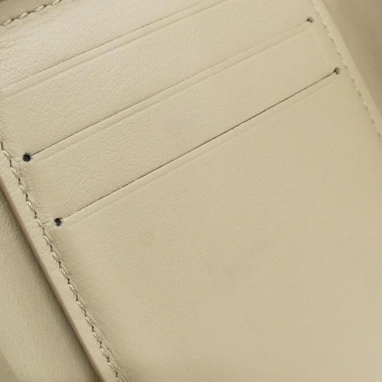 ルイヴィトン マヒナ レザー財布