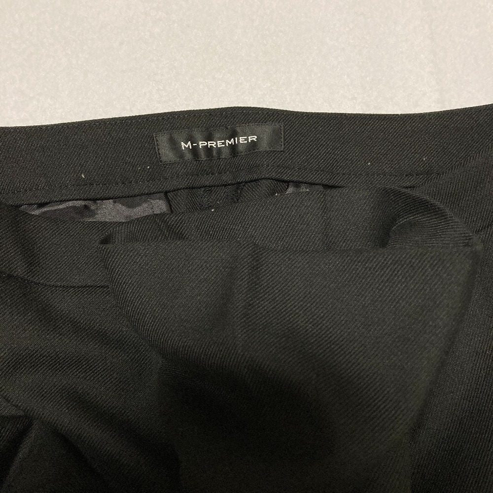 エムプルミエ ストレッチツイルテーパードパンツ