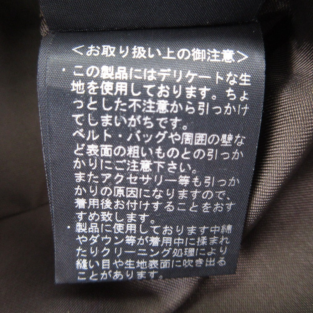 エムプルミエブラック フリルベルトコート