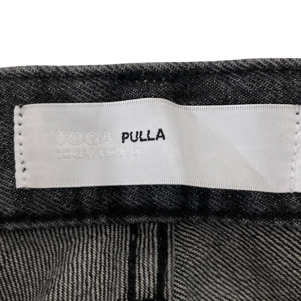 トーガプルラ デニムフレアパンツ