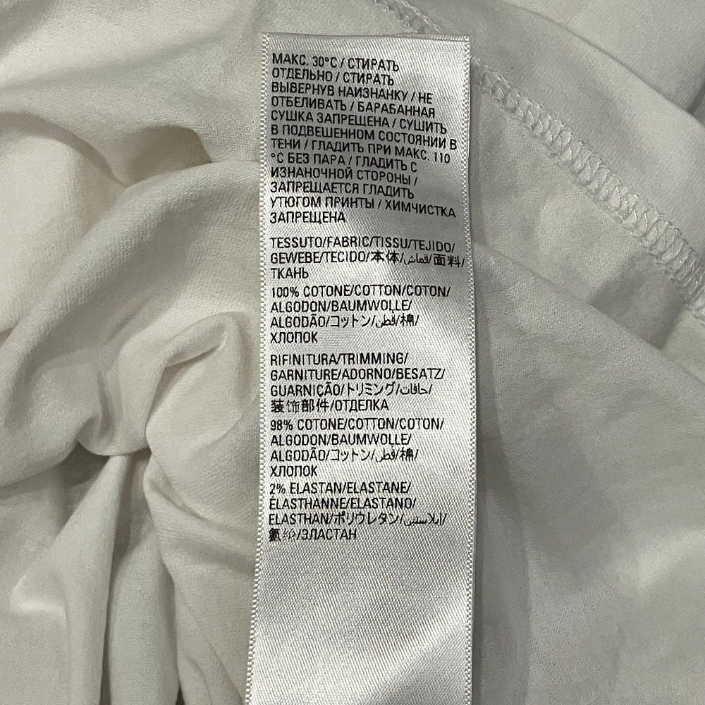 バレンシアガ ケアラベルプリント コットンオーバーサイズTシャツ