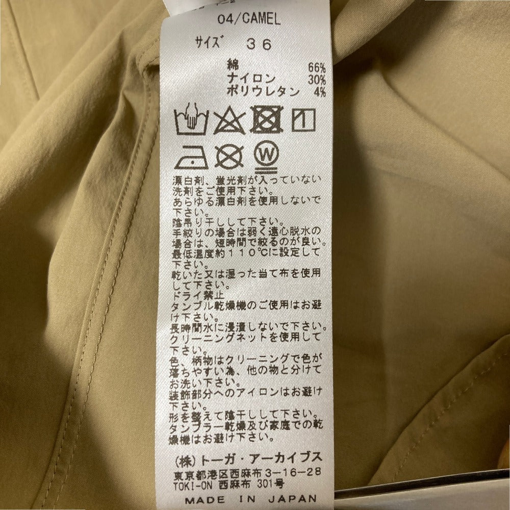 トーガプルラ アイレットドットボタンブラウス