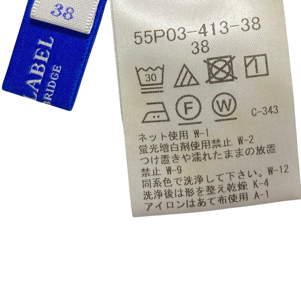 ブルーレーベルクレストブリッジ コットンポンチボウカラートップス