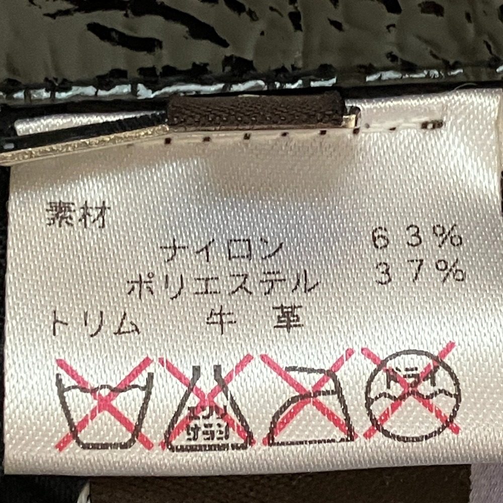 コーチ シグネチャー ナイロントレンチコート