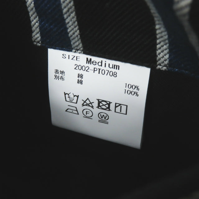クオン TRIMMED TROUSERS コットンパンツ