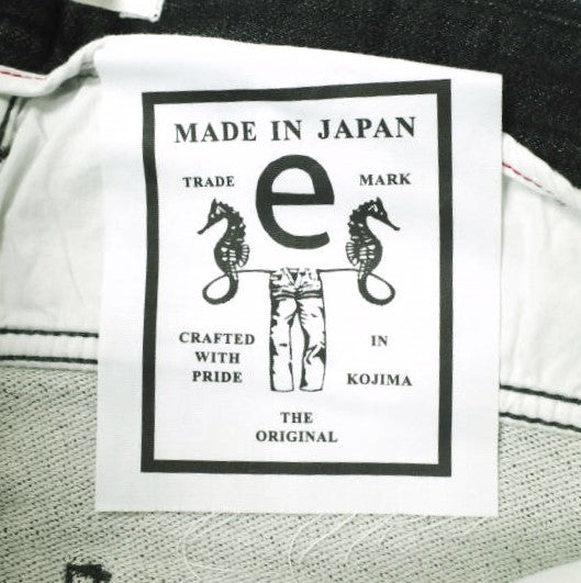 イージーンズ TWIST コットン混デニムパンツ