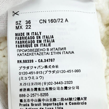 プラダ ラムファー ベルト付きニットコート