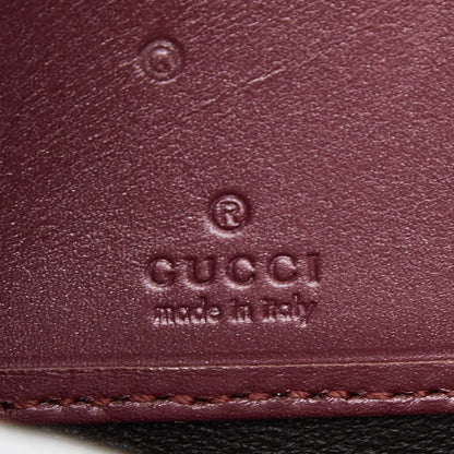 グッチ マイクログッチシマ エナメル 長財布