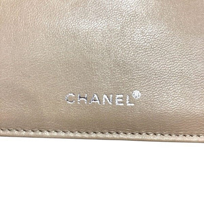 シャネル ニュートラベルライン キャンバス レザー 二つ折り財布