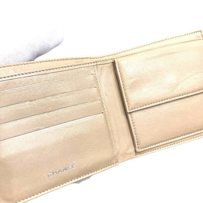 シャネル ニュートラベルライン キャンバス レザー 二つ折り財布
