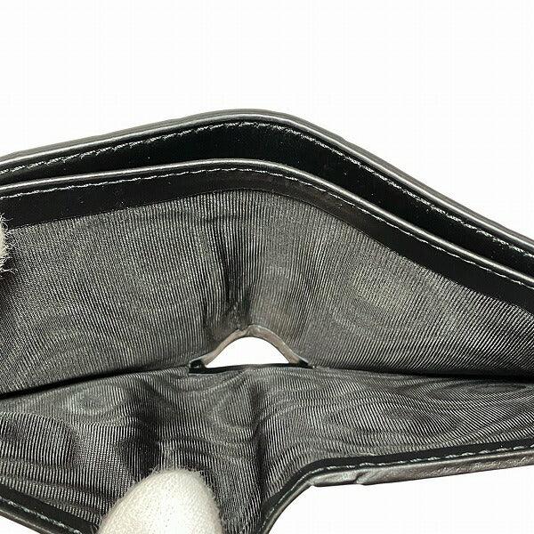 グッチ GGシグネチャー レザー二つ折り財布