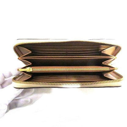 コーチ アコーディオン ジップ ウォレット フローラル