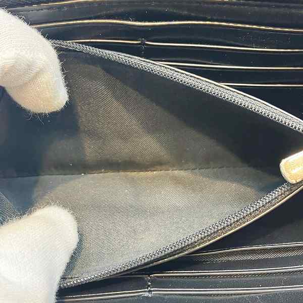 コーチ シグネチャー レザーPVC 長財布
