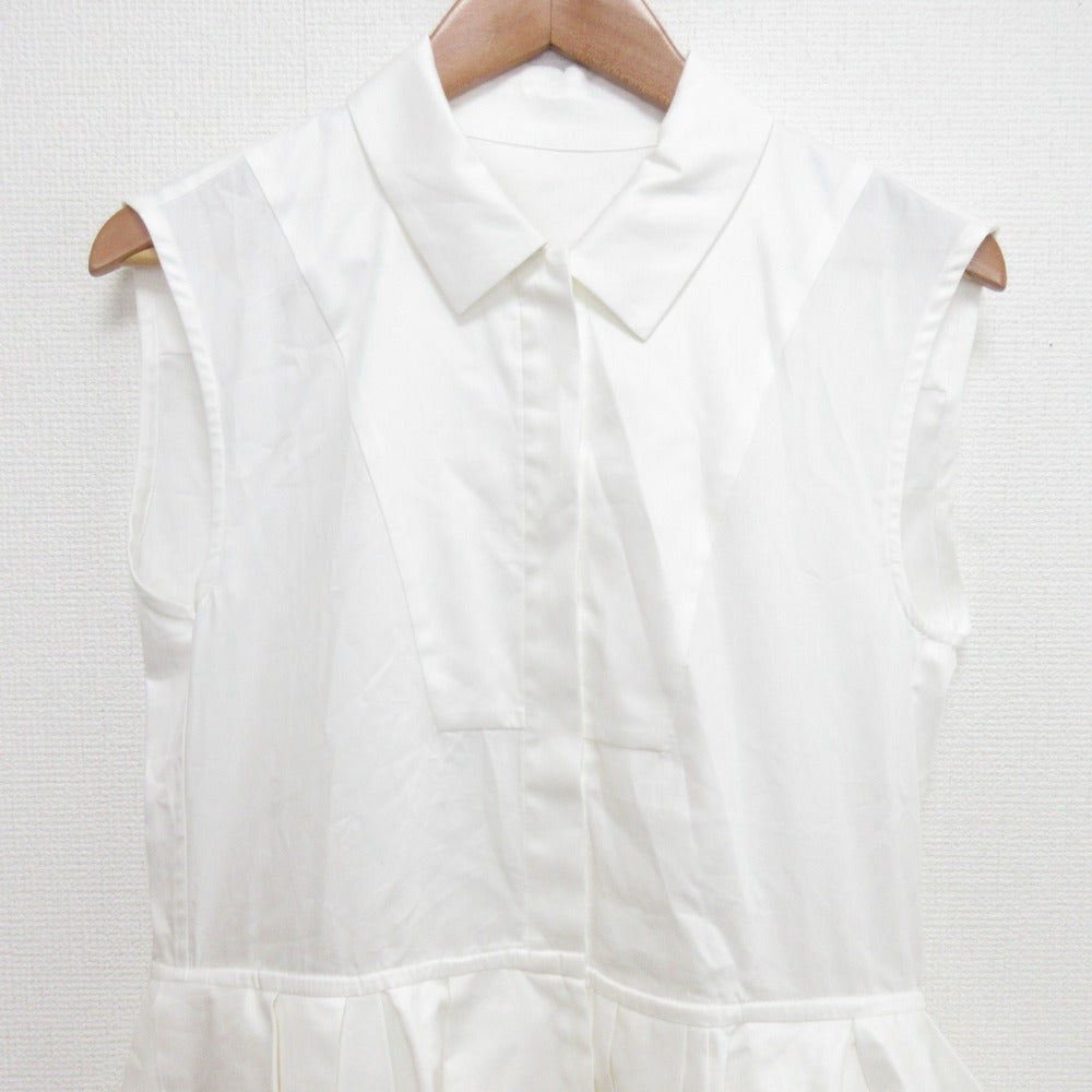 cygne ペプラムノースリーブシャツ