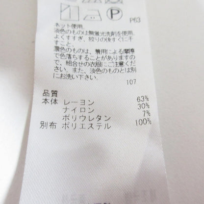 自由区 ドレーピーポンチラッフルスリーブカットソー