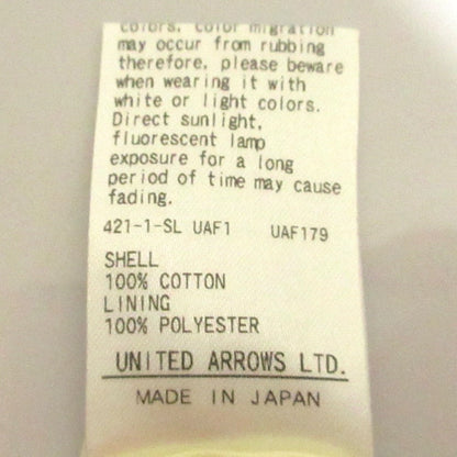 AEWEN MATOPH フロントリボンVネックスリーブレスブラウス
