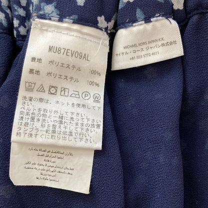 マイケルコースラッフルセットアップ
