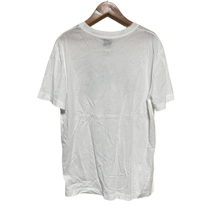 パトゥ オーガニックコットンフローラルカーブロゴTシャツ