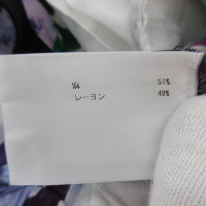 クリスチャンワイナンツ フラワープリントテーパードパンツ