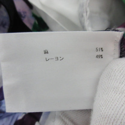 クリスチャンワイナンツ フラワープリントテーパードパンツ