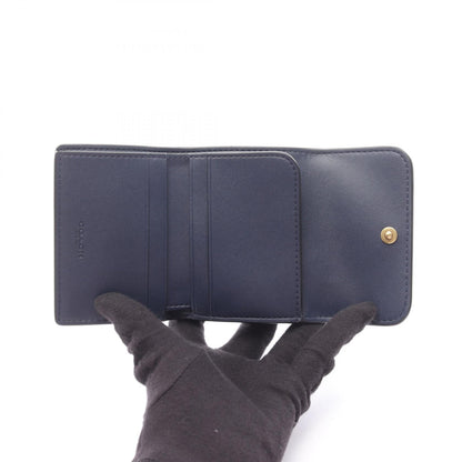 コーチ ESSENTIAL CARD HOLDER WALLET レザー三つ折り財布