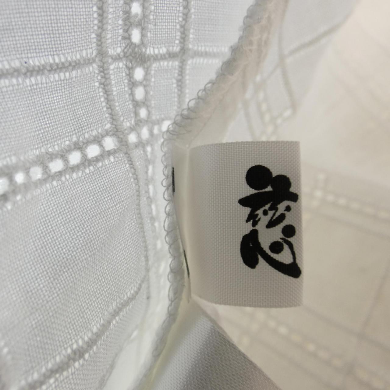 慈雨 トップス