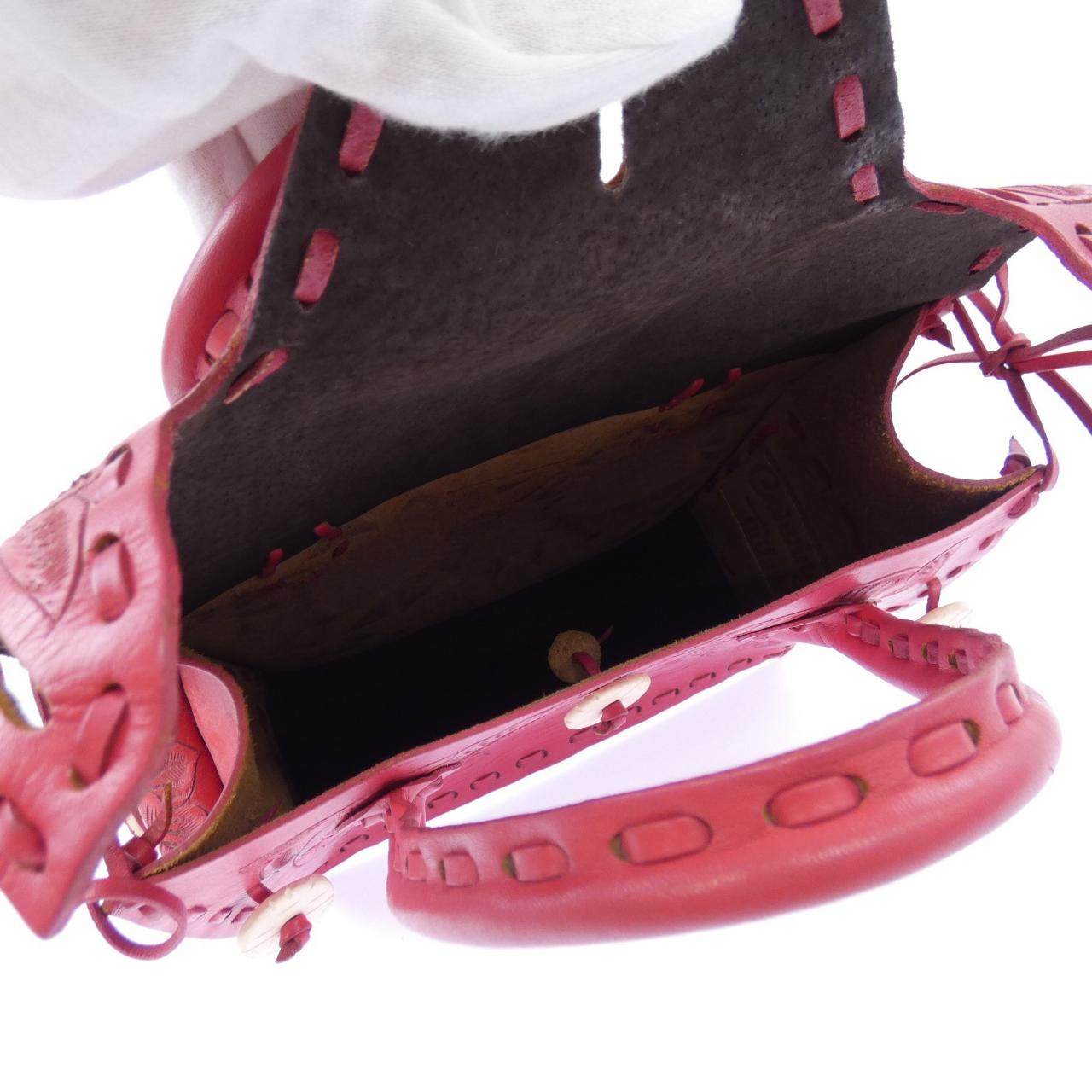 カービングトライブス レザーハンドバッグ