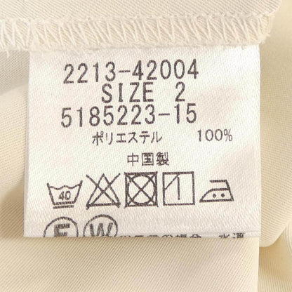 クイーンズコート トップス