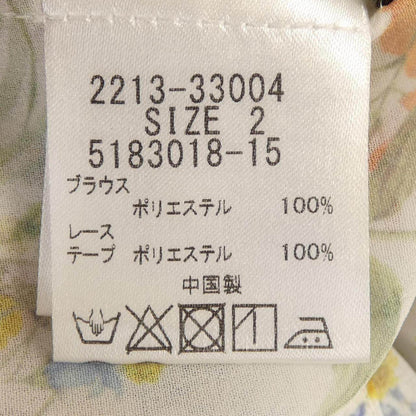 クイーンズコート トップス
