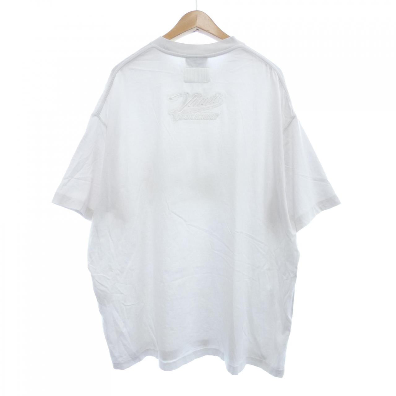 ブイティーエムエヌティーエス コットンTシャツ