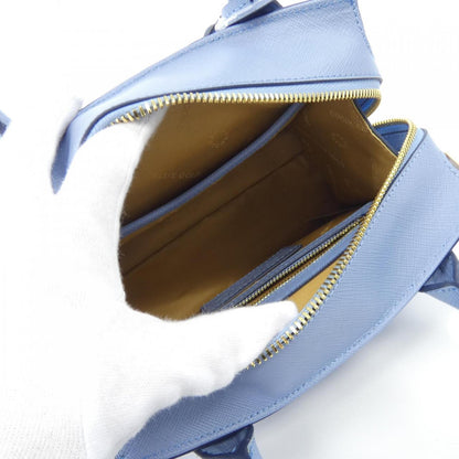 ココセリュクスゴールド レザーハンドバッグ