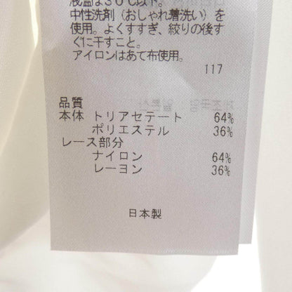 ベイジュ トップス