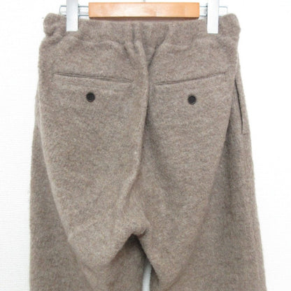 ネストローブ ウールパンツ