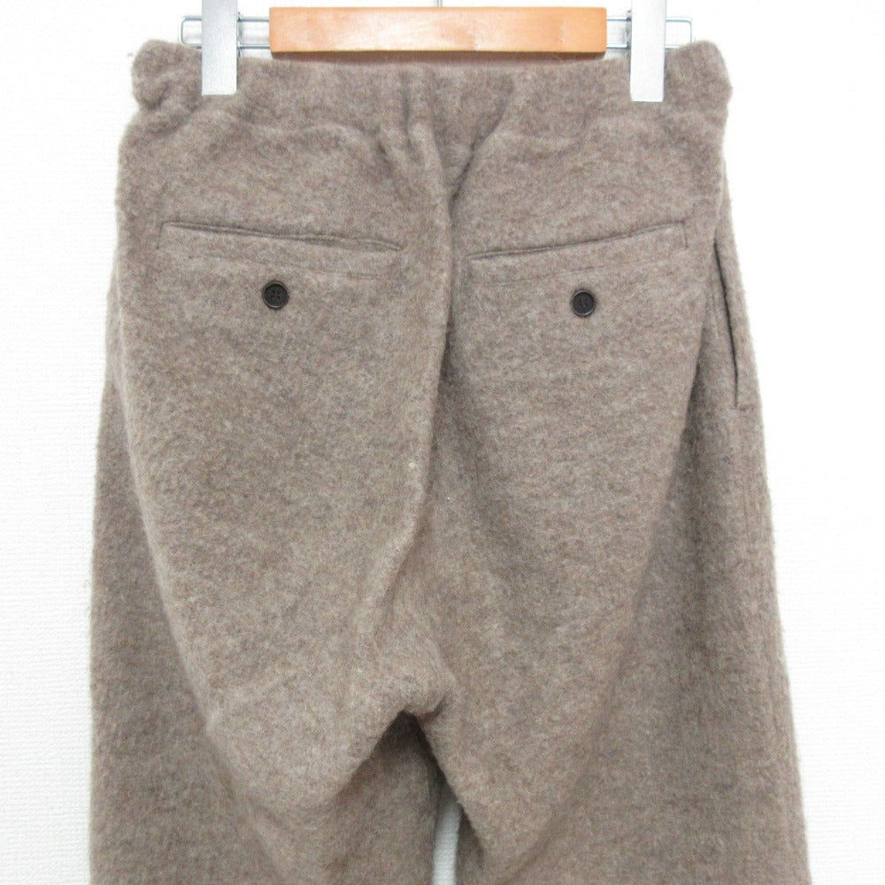 ネストローブ ウールパンツ