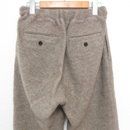 ネストローブ ウールパンツ