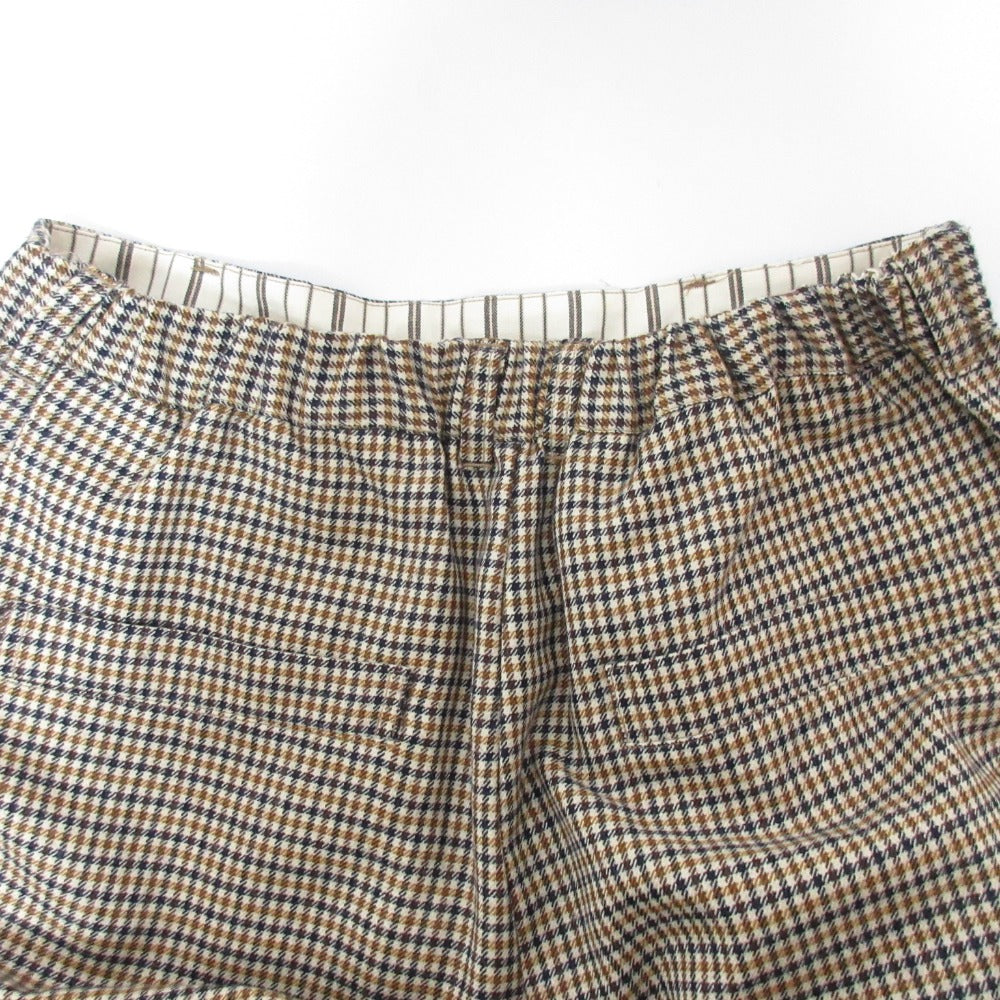 ネストローブ ウールチェックパンツ