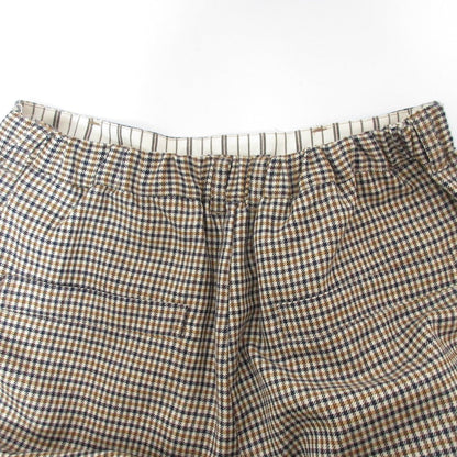 ネストローブ ウールチェックパンツ